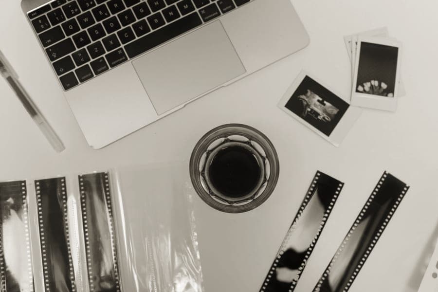 Instant film packs arranged on a kraft paper surface